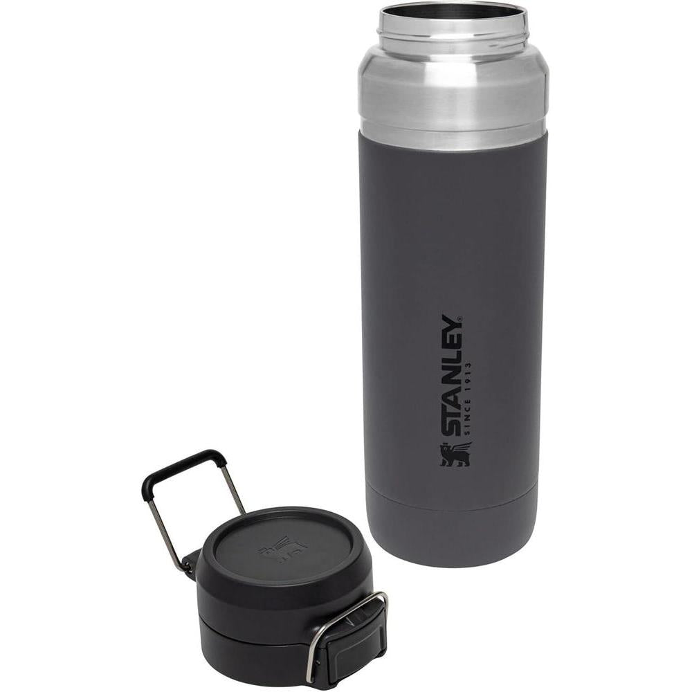 Stanley Quick Flip GO Botella de agua de acero inoxidable con tapa de botón a prueba de fugas, ideal para viajes y deportes, color carbón