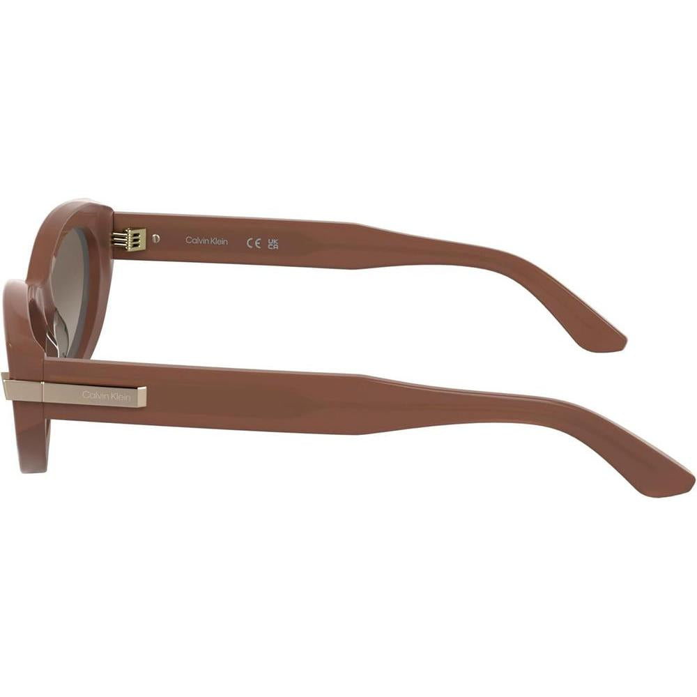Calvin Klein Gafas de Sol para Mujer con Diseño Sofisticado, Estilo Ojo de Gato, Rosa Opalina con Lente Gradiente