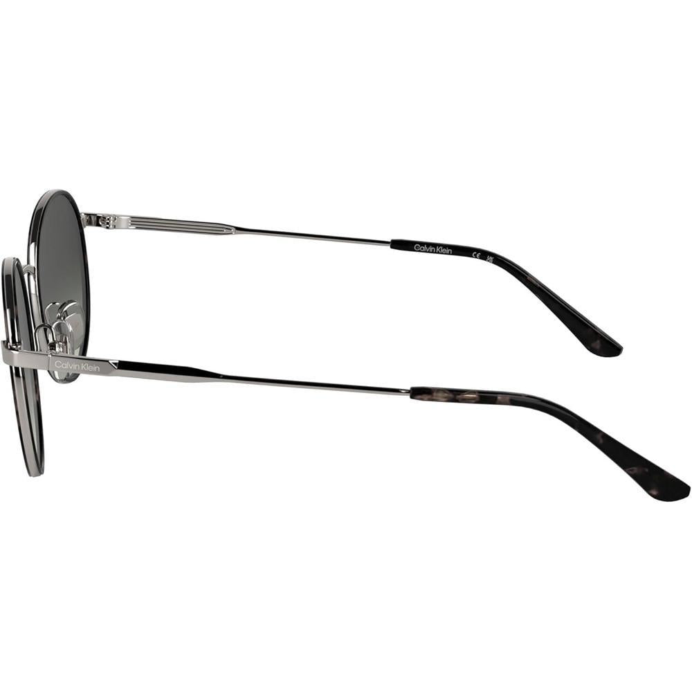 Lentes de sol Calvin Klein CK25101S con diseño redondo y marco de metal, incluyendo almohadillas nasales ajustables para mayor comodidad